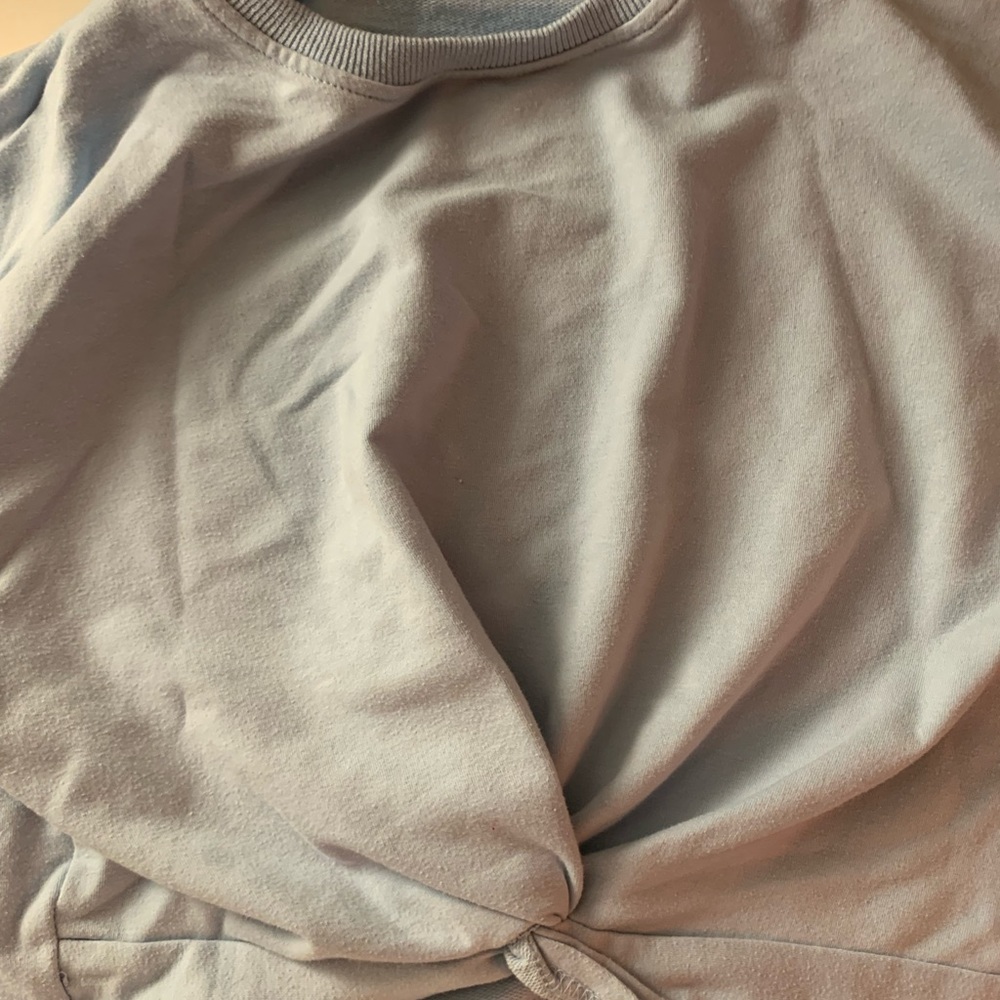 Tied knit light blue sweater